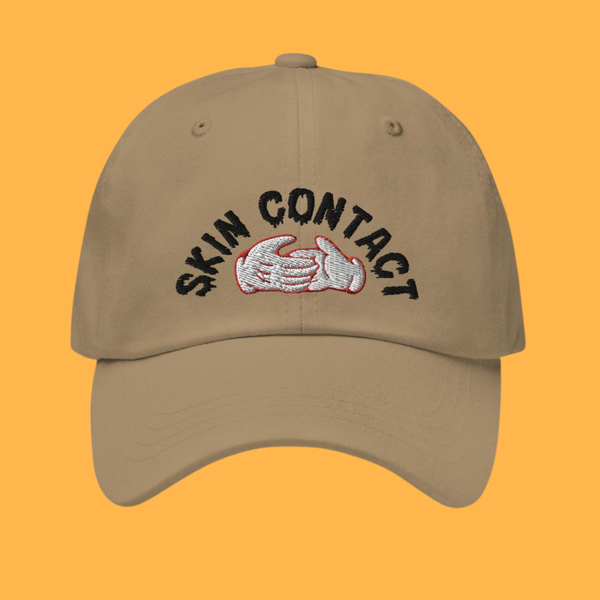 SKIN CONTACT DAD HAT.